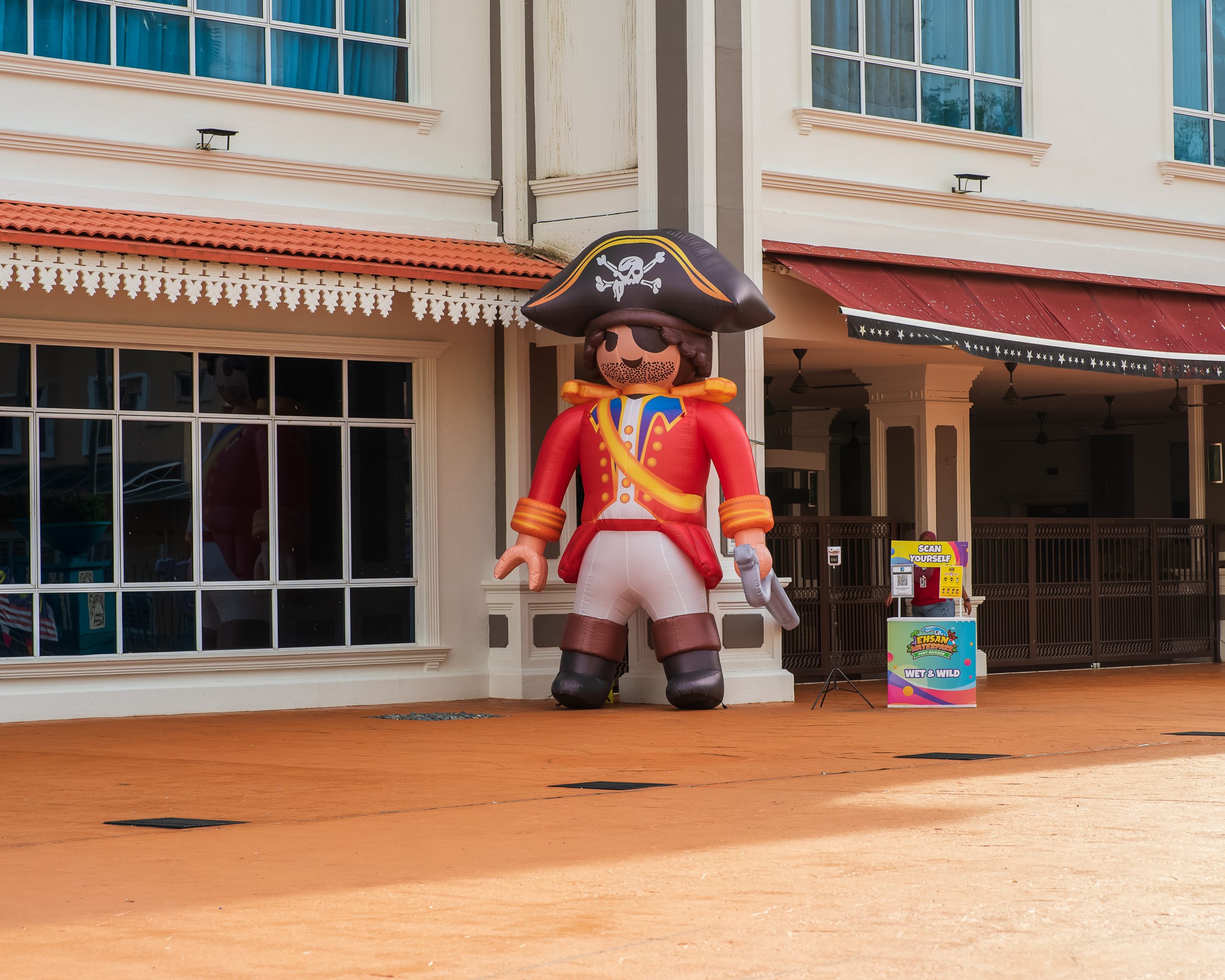 Port Dickson, Malaysia - Nov 19, 2021: Inflatable tube Lego Pirate character at the Ehsan Waterpark.